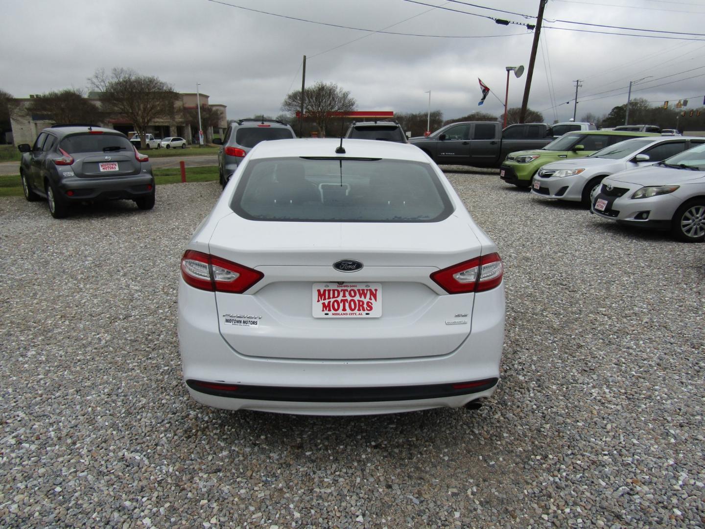 2015 White /Gray Ford Fusion SE (1FA6P0HD2F5) with an 1.5L L4 DOHC 16V engine, Automatic transmission, located at 15016 S Hwy 231, Midland City, AL, 36350, (334) 983-3001, 31.306210, -85.495277 - Photo#6